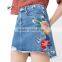 Summer trendy womens short skirts fashion womens flornal embroidery hole denim skirt