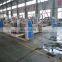 Automatic corrugated paper sheet gluing machine