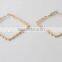 delicate gold quadrate hoop earring