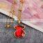 Guangzhou biggest wholesale fashionable gold long chain red crystal necklace with bear pendant