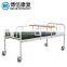 Flat hospital medical bed steal head board with food tray steel guardrails strip model surface bed with sponge universal wheels