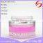 white cream cosmetic glass bottle