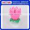 Lotus shaped rotating birthday candle with round base