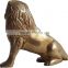 brass lion sitting sculpture