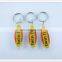 Acrylic keychain with surfboard shape and custom logo inserted