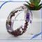 Pine needles inside transparent clear acrylic bangle stand