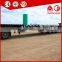 Heavy duty tri-axle 60 ton low flatbed semi trailer/ low bed truck trailer for excavator transportation