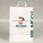 Twisted rope scarf paper packaging bags with custom 100% recycable paper white craft paper bags for kids shoes