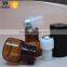 wholesale amber color 1ml glass roll on bottle with stainless steel roller ball