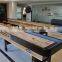 Shuffleboard table game machine