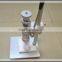 Hand operated perfume pump capper