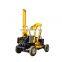 Solar power photovoltaic crawler ground drilling small pile driver