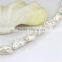 White irregular freshwater pearl strand around 16 mm biwa pearl strand