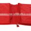 Red polar fleece blanket for airline travel in a zipper bag easy for carry