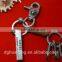 Antique silver alloy keychain with coiled real leather cord and beer bottle opener