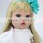 Soft safety material cheap girls toys 22 inches silicone doll made in China