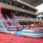 volcano lava themed inflatable water slide with a bigger water pool