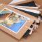 popular creative paper photo frames hanging over at the wall