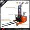 Stand on type counterbalanced electric walkie mast reach pallet stacker
