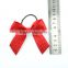 Selling red satin ribbon bow with silver elastic loop