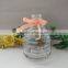 Hanging glass bee catcher with metal handle and wood cork stopper for home and garden use