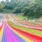 New attractive outdoor unpowered cheap price rainbow slide game on sale