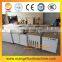 Ice cream cone baking and rolling machine