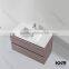 white matte resin basins, modern art above counter top basin