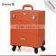 Hot sales orange hairdresser trolley makeup professional case for dresser