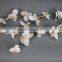 Artificial white orchid flower garland for window display