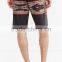 Water-resistant mens custom boardshorts in geometric pattern