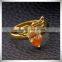 China Imported Jewelry Smooth Metal Angle Wing Red Zircon Gold Engagement Ring