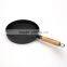 Mini round cast iron baking pan with wooden handle