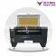K1390 150w co2 laser cutting machine for cutting fabric and leather material