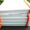 white pu full cover embossed logo notebook with orange elastic band