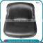 Compact steel pan seat for road sweeper truck