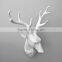 pure white aninal head hanging white deer head with hook on back