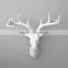 pure white aninal head hanging white deer head with hook on back