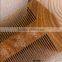 Both sides of wooden comb;comb