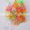Girl's colorful rubber hairbands in plastic box