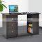 wooden computer desk with bookshelf and drawers