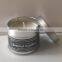 Silvery scented tin candle with string containers