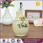 Beige round olive branch pattern ceramic oil and vinegar bottles wholesale