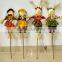 Paper straw and fabric scarecrow for autumn and harvest decoration