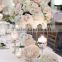 Blush and white tall centerpiece. Dahlias, hydrangea, curly willow, roses, stock, dusty miler