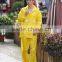 High visibility yellow motorcycle riding rain suit