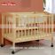 Safety standards convenient design baby crib attached bed with removable wheels