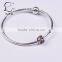 Promotional silver outline charm bracelet