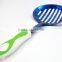 Non-stick TPR handle 100% Food Grade titanize kitchen slotted skimmer