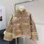 The new winter stand-up collar mink fur coat with silk jacquard buttons and thickened Chinese-style goose down jackets exude a high-end feel for women